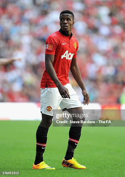 Wilfried Zaha of Manchester United looks on during the FA Community Shield match between Manchester United and Wigan Athletic at Wembley Stadium on...