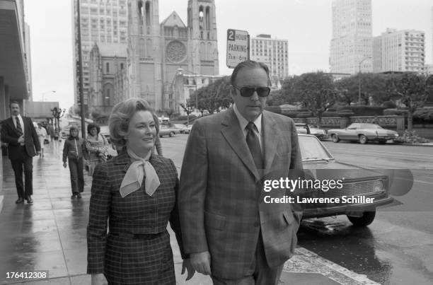 American businessman, chairman of the Hearst Corporation board Randolph Hearst and his wife, University of California regent Catherine Hearst , walk...