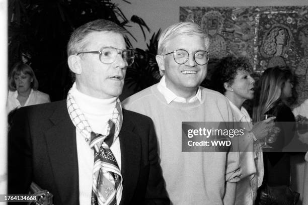 Roddy McDowall and David Hockney attend a party in Beverly Hills, California, on June 25, 1987.