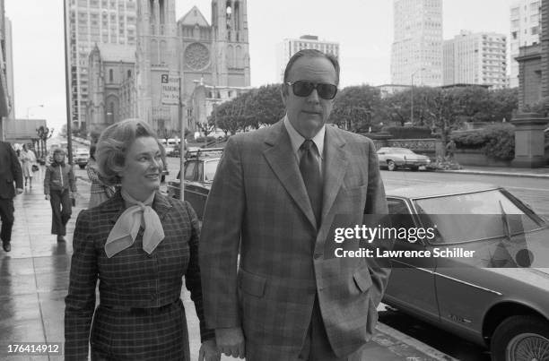 American businessman, chairman of the Hearst Corporation board Randolph Hearst and his wife, University of California regent Catherine Hearst , walk...