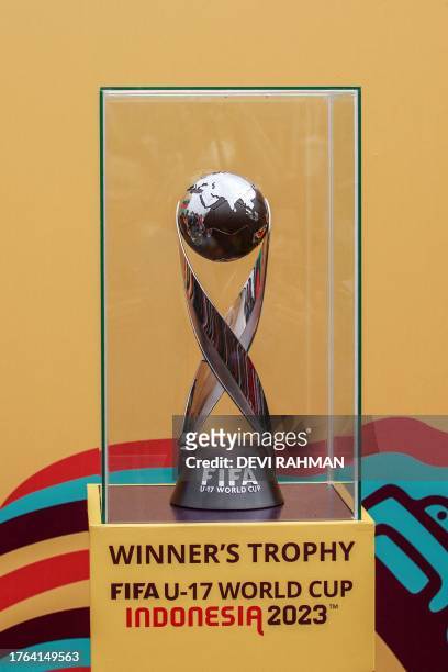The FIFA U-17 World Cup trophy is seen on display during a promotional event for the upcoming youth football tournament in Solo on November 5, 2023.