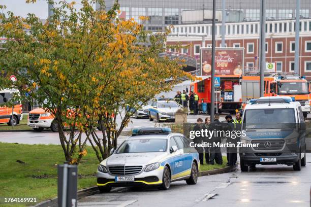 Police officers cordon off the street next to terminal Tango at Hamburg Airport on November 5, 2023 in Hamburg, Germany. Police are currently in a...