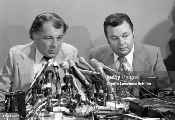 American attorneys F. Lee Bailey and J. Albert Johnson sit behind a bank of microphones during a press conference, San Francisco, California, 1976....