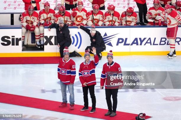 General view is seen of former Montreal Canadiens Jose Theodore, Steve Begin, Stephane Quintal at center ice during pre-game ceremonies before the...