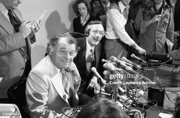 American attorneys F. Lee Bailey and James Browning sit behind a bank of microphones during a press conference, San Francisco, California, 1976. At...