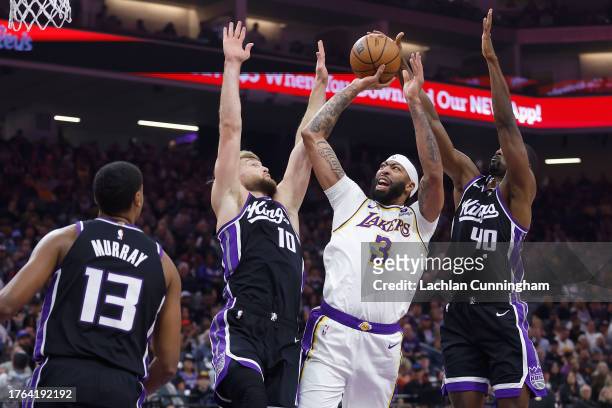 Harrison Barnes of the Sacramento Kings blocks the shot of Anthony Davis of the Los Angeles Lakers in the first quarter at Golden 1 Center on October...