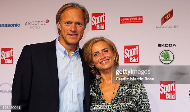 Gerhard und Isabelle Delling pose for the media before the Sport Bild Awards at Fischauktionshalle on August 12, 2013 in Hamburg, Germany.