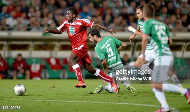Olivier Occean of Kaiserslautern wins the sprint against his opponents during the second Bundesliga match between SpVgg Greuther Fuerth and 1. FC...
