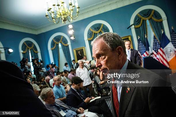 New York City Mayor Michael Bloomberg leaves a press conference after addressing New York Police Department's Stop-and-Frisk practice on August 12,...