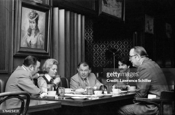 American attorneys F. Lee Bailey and assistant J. Albert Johnson sit on either side of University of California regent Catherine Hearst , and across...