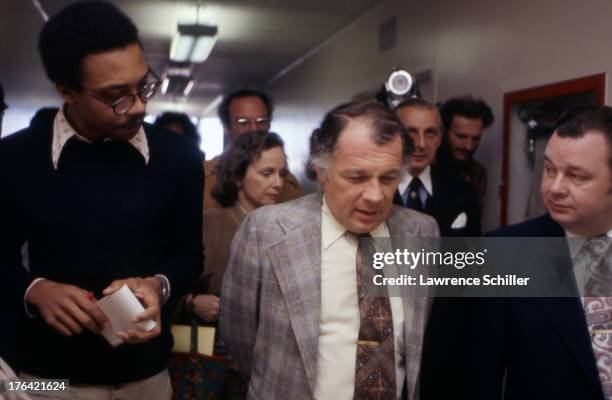 As they walk down a corridor, American attorneys F. Lee Bailey and J. Albert Johnson speak to the media, San Francisco, California, 1976. At the...