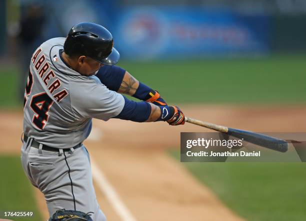 Miguel Cabrera of the Detroit Tigers hits a solo home run in the 1st inning against the Chicago White Sox at U.S. Cellular Field on August 12, 2013...