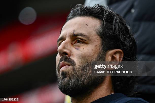 Lyon's Italian head coach Fabio Grosso looks on prior to the French L1 football match between Olympique Lyonnais and FC Metz at The Groupama Stadium...