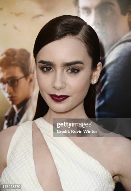 Actress Lily Collins attends the premiere of Screen Gems & Constantin Films' "The Mortal Instruments: City of Bones" at ArcLight Cinemas Cinerama...