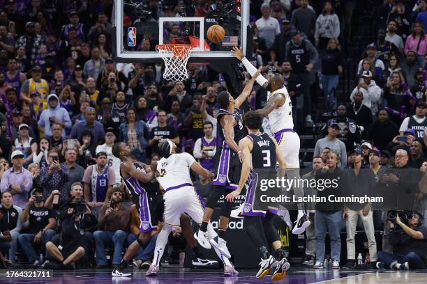 LeBron James of the Los Angeles Lakers makes a basket to tie the game in the fourth quarter against the Sacramento Kings at Golden 1 Center on...