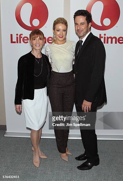 Actors Jonathan Silverman and Jennifer Finnigan pose with Diane Finnigan the "Baby Sellers" premiere at United Nations Headquarters on August 12,...