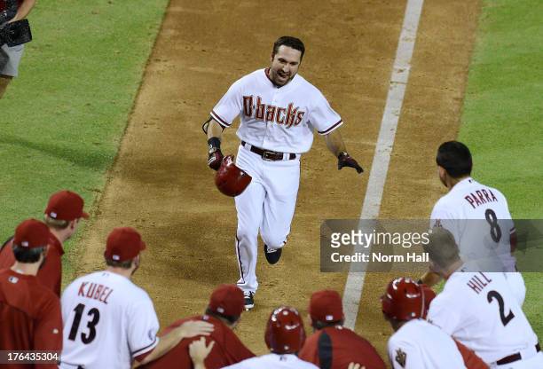 Adam Eaton of the Arizona Diamondbacks and teammates celebrate his game-winning, walk-off home run against the Baltimore Orioles at Chase Field on...