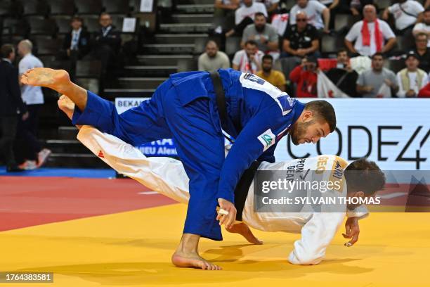 France's Alexis Mathieu and Georgia's Lasha Bekauri compete in the men's -90 kg quarter-final during the European Judo Championships 2023 at the Sud...