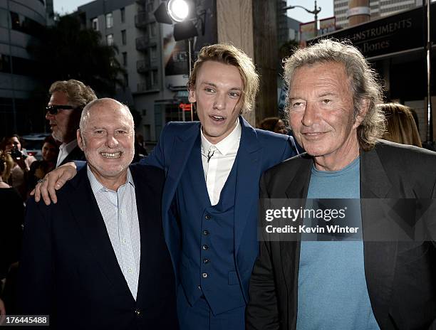 Execuitive producer Michael Lynne, actor Jamie Campbell Bower and executive producer Bob Shaye arrive at the premiere of Screen Gems & Constantin...