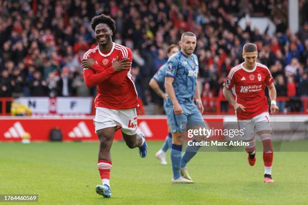 Ola Aina of Nottingham Forest celebrates scoring the opening goal during the Premier League match between Nottingham Forest and Aston Villa at City...