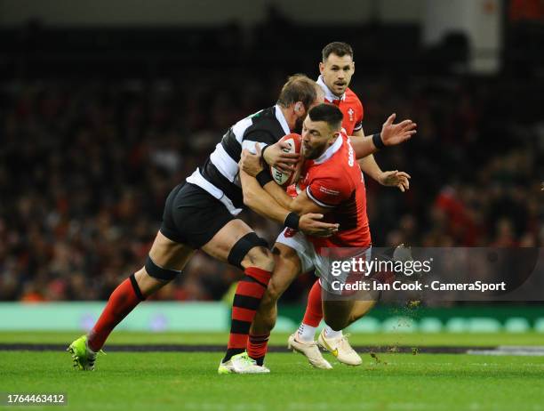 Wales's Johnny Williams takes on Barbarian's Alun Wyn Jones during the Rugby International match between Wales and Barbarians at Principality Stadium...