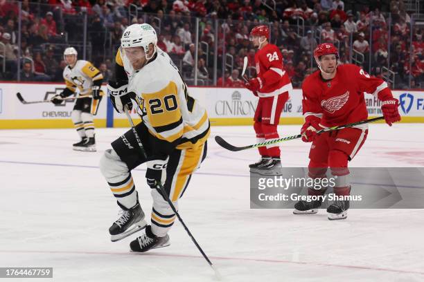 Lars Eller of the Pittsburgh Penguins skates against the Detroit Red Wings at Little Caesars Arena on October 18, 2023 in Detroit, Michigan.