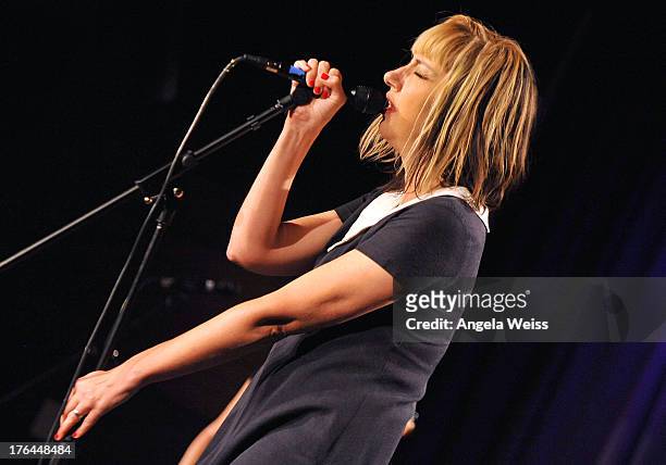 Kim Shattuck of Bad Empressions performs at The GRAMMY Museum on August 12, 2013 in Los Angeles, California.