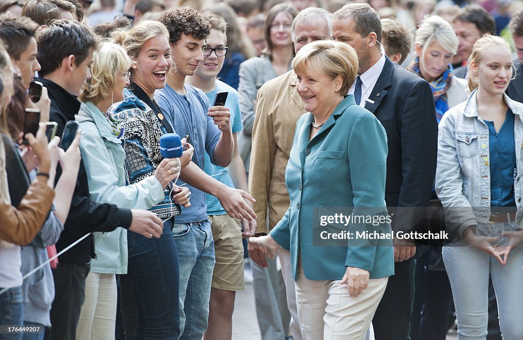 Merkel Lectures High School Students On Berlin Wall