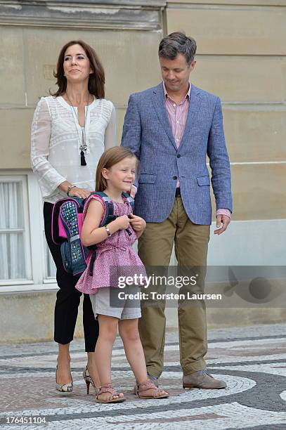 Princess Isabella of Denmark departs Amalienborg Palace escorted by her parents Prince Frederik of Denmark and Princess Mary of Denmark for her first...