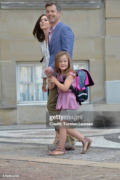 Princess Isabella of Denmark departs Amalienborg Palace escorted by her parents Prince Frederik of Denmark and Princess Mary of Denmark for her first...
