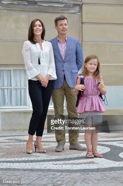 Princess Isabella of Denmark departs Amalienborg Palace escorted by her parents Prince Frederik of Denmark and Princess Mary of Denmark for her first...