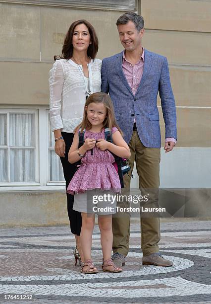 Princess Isabella of Denmark departs Amalienborg Palace escorted by her parents Prince Frederik of Denmark and Princess Mary of Denmark for her first...