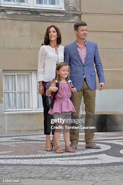 Princess Isabella of Denmark departs Amalienborg Palace escorted by her parents Prince Frederik of Denmark and Princess Mary of Denmark for her first...