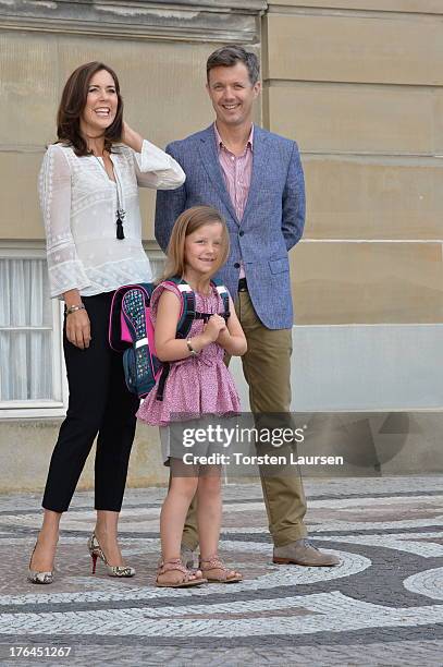 Princess Isabella of Denmark departs Amalienborg Palace escorted by her parents Prince Frederik of Denmark and Princess Mary of Denmark for her first...