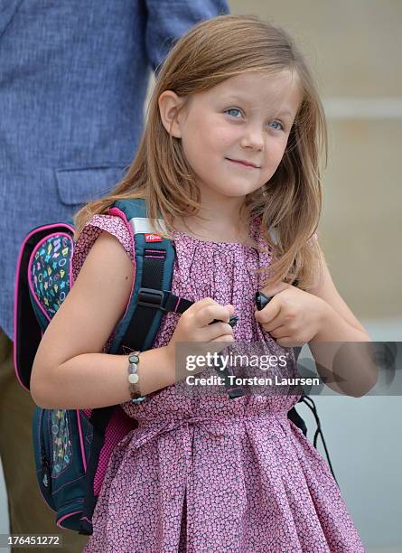 Princess Isabella of Denmark departs Amalienborg Palace escorted by her parents Prince Frederik of Denmark and Princess Mary of Denmark for her first...