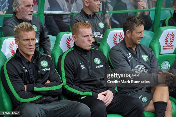 Celtic manager Neil Lennon in the dugout with assistants Johan Mjallby and Garry Parker at the start of the Scottish Premier League game between...