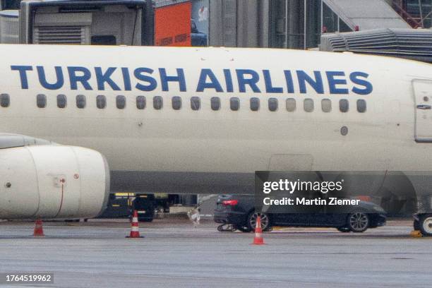 Robot of the German bomb squad operates next to the hostage takers car at Hamburg Airport on November 5, 2023 in Hamburg, Germany. The hostage taker...