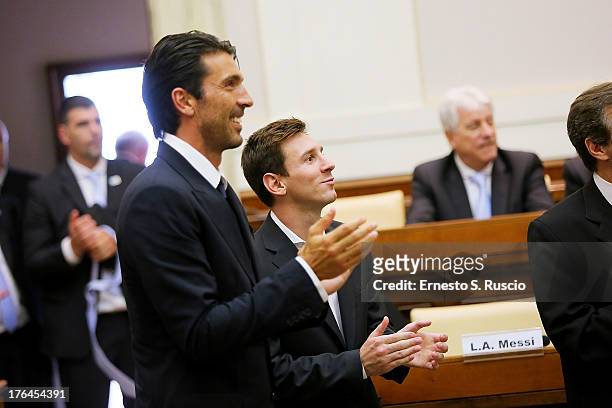 Lionel Messi and Gianluigi Buffon attend the press confernce of Italy and Argentina Football Teams at The Vatican on August 13, 2013 in Vatican City,...