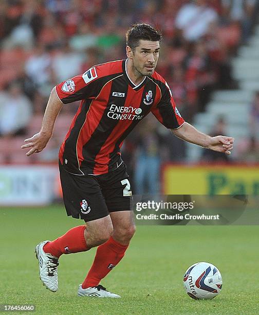 Richard Hughes of Bournemouth attacks during the Capital One Cup First Round match between AFC Bournemouth and Portsmouth at The Goldsands Stadium on...