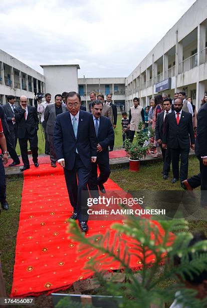 Secretary-General Ban Ki-moon arrives to plant a tree at the Islamabad College for Girls in Islamabad on August 13, 2013. UN chief Ban Ki-moon...