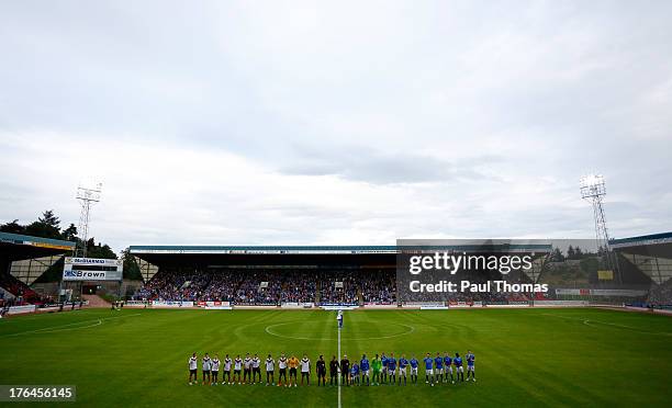 Players line up before the UEFA Europa League third qualifying round second leg match between St Johnstone and FC Minsk at McDiarmid Park stadium on...