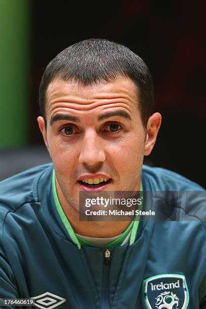 John O'Shea, captain of Ireland attends a press conference at the Cardiff City Stadium on August 13, 2013 in Cardiff, Wales.