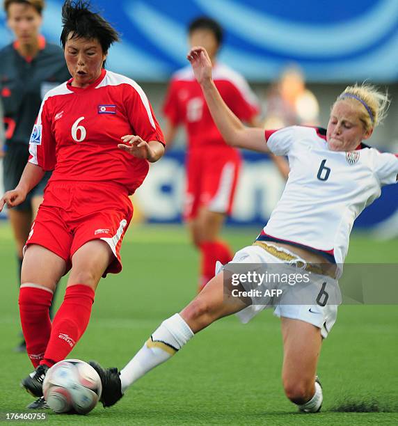 Elli Reed vies for the ball against North Korea's Kim Chun Hui during their FIFA U20 Women's World Cup 2008 final at the Municipal Florida Stadium on...