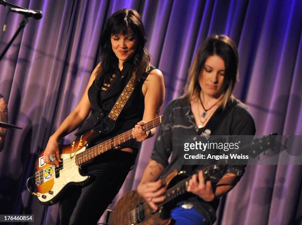 Dominique Davalos and Shae Padilla of Bad Empressions perform onstage at The GRAMMY Museum on August 12, 2013 in Los Angeles, California.