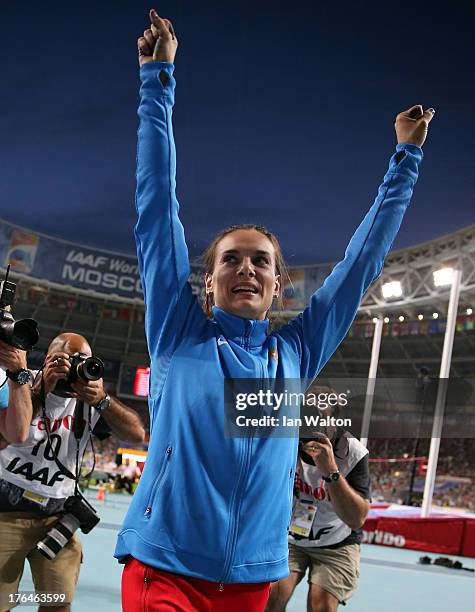 Elena Isinbaeva of Russia celebrates winning gold in the Women's pole vault final during Day Four of the 14th IAAF World Athletics Championships...