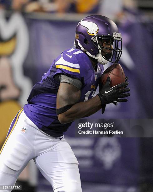 Stephen Burton of the Minnesota Vikings catches the football during the preseason game against the Houston Texans on August 9, 2013 at Mall of...