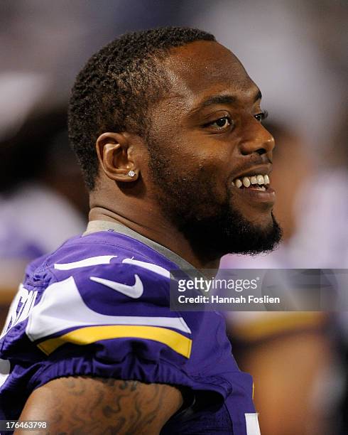 Erin Henderson of the Minnesota Vikings looks on during the preseason game against the Houston Texans on August 9, 2013 at Mall of America Field at...