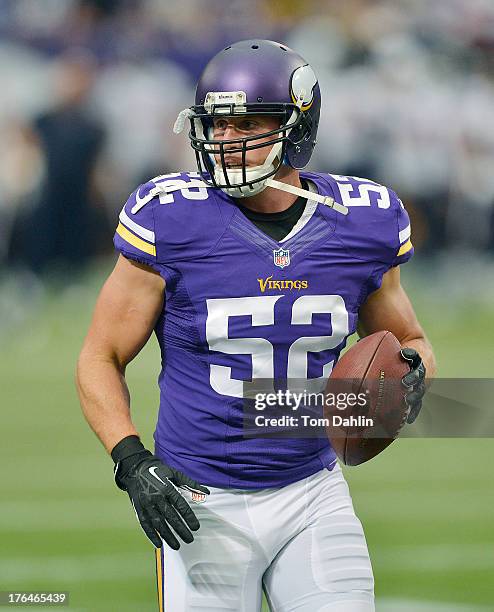 Chad Greenway of the Minnesota Vikings warms up prior to an NFL preseason game against the Houston Texans at Mall of America Field, on August 9, 2013...