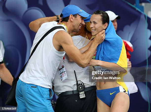 Oleksiy Kasyanov of Ukraine congratulates Hanna Melnychenko of Ukraine on winning gold in the heptathlon during Day Four of the 14th IAAF World...