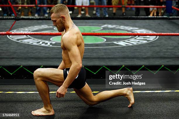 Irish featherweight Conor McGregor holds an open training session for media at Peter Welch's Boxing Gym on August 13, 2013 in Boston, Massachusetts.